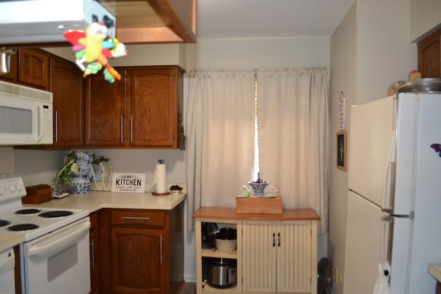 kitchen with white appliances