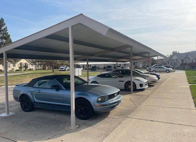 view of parking featuring a carport