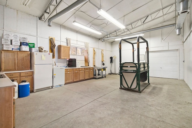 garage with white fridge