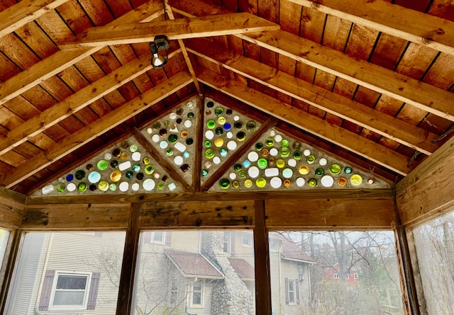 room details featuring beam ceiling and wood ceiling