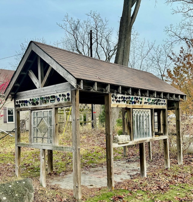 view of community with an outdoor structure