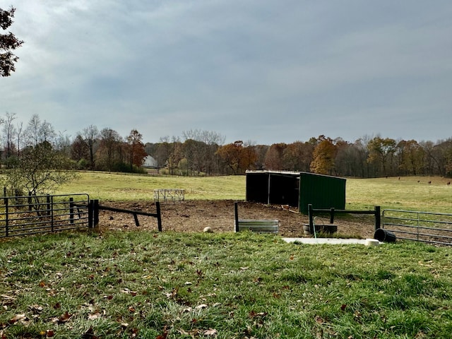 exterior space featuring an outbuilding and a rural view