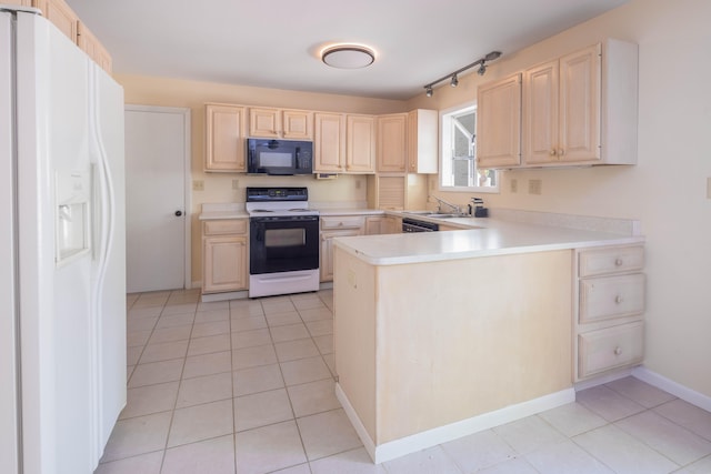 kitchen with kitchen peninsula, white appliances, sink, and light tile patterned floors