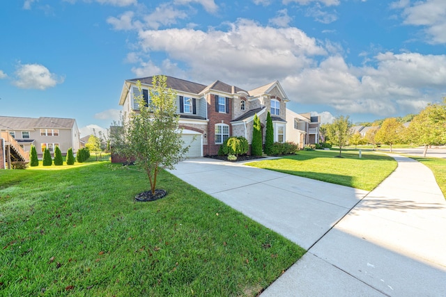 view of front of home with a front yard and a garage