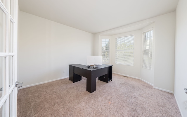 office space with light carpet