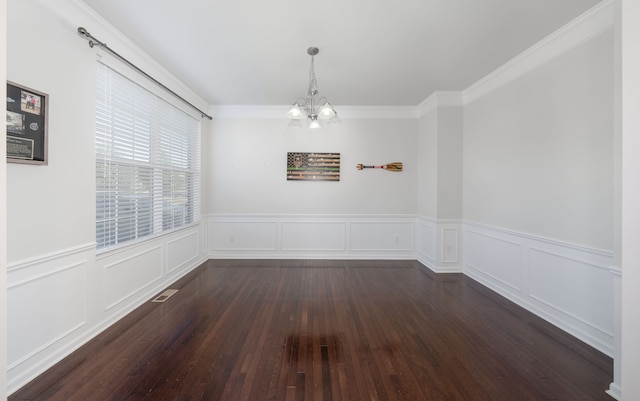 unfurnished dining area with an inviting chandelier, crown molding, and dark wood-type flooring