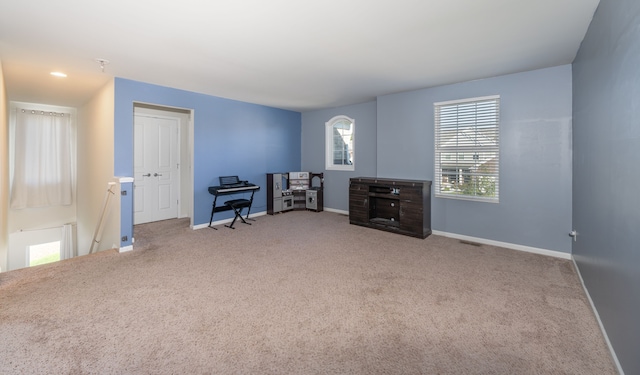 miscellaneous room with carpet