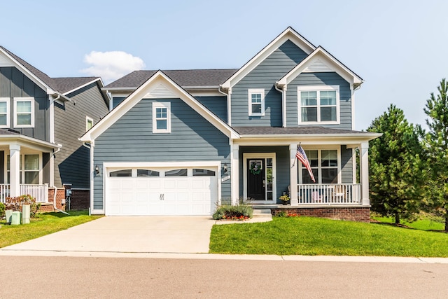 craftsman house featuring a front lawn, a garage, and a porch