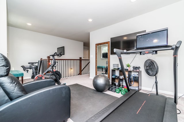 workout room featuring carpet flooring