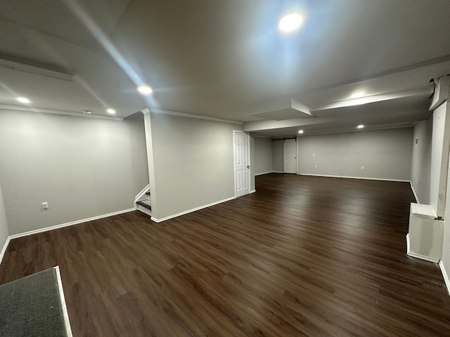 basement featuring dark wood-type flooring