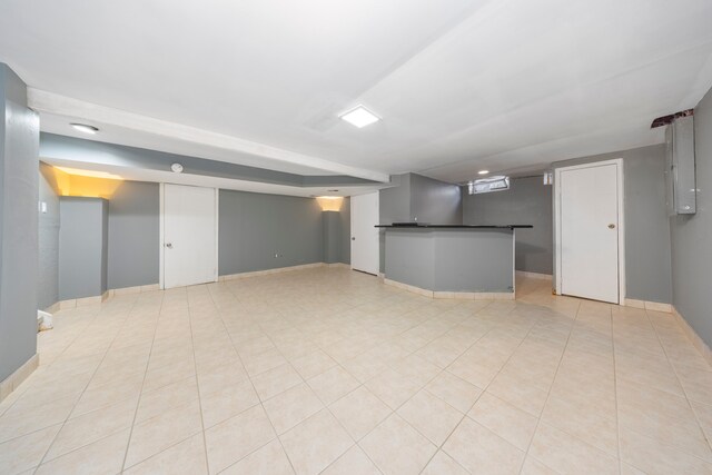 5731 Farmington Rd, West Bloomfield, MI 48322 - finished basement featuring baseboards and light tile patterned floors