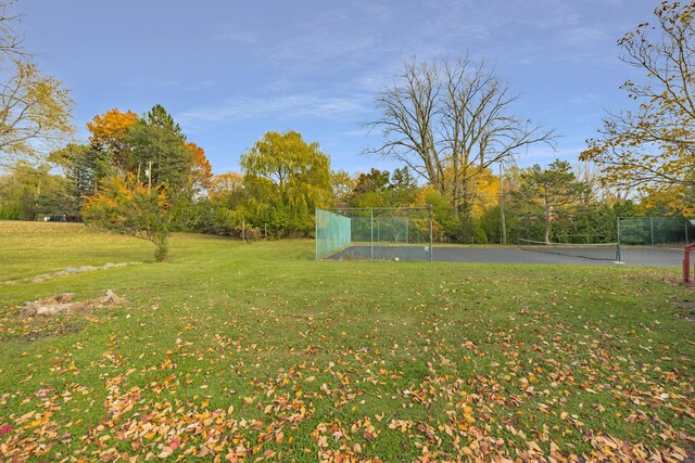 5731 Farmington Rd, West Bloomfield, MI 48322 - view of yard with a tennis court