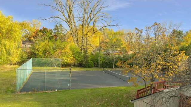 5731 Farmington Rd, West Bloomfield, MI 48322 - view of tennis court featuring a yard