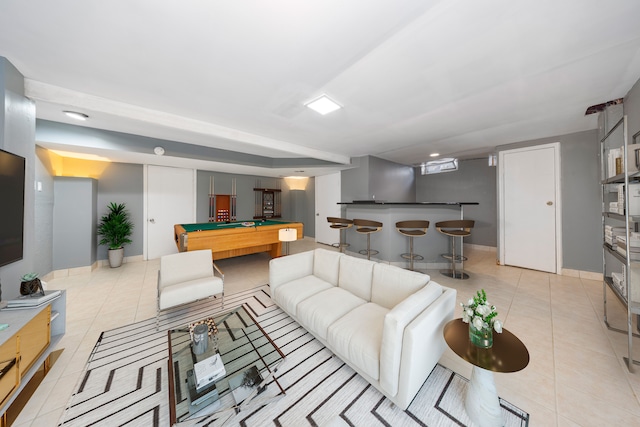 living room with bar area, light tile patterned floors, and billiards