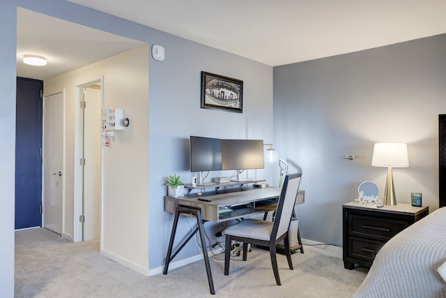 bedroom featuring light colored carpet