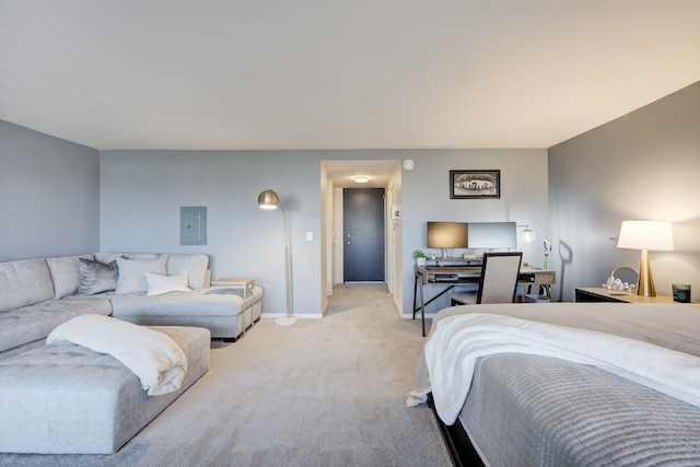 bedroom featuring light carpet and electric panel