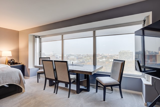 view of carpeted dining space