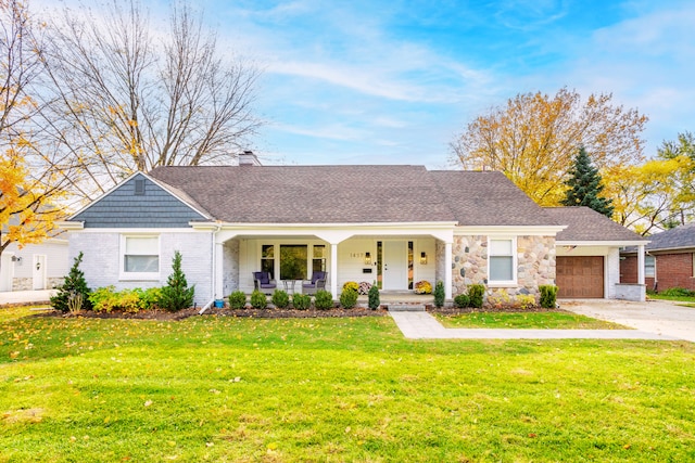 ranch-style house with a front lawn, covered porch, and a garage