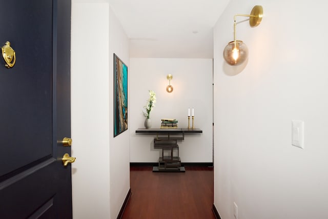 hallway featuring dark hardwood / wood-style floors