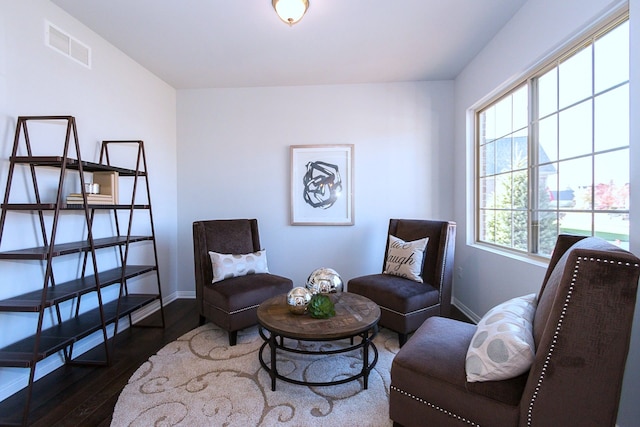 living area featuring dark hardwood / wood-style floors