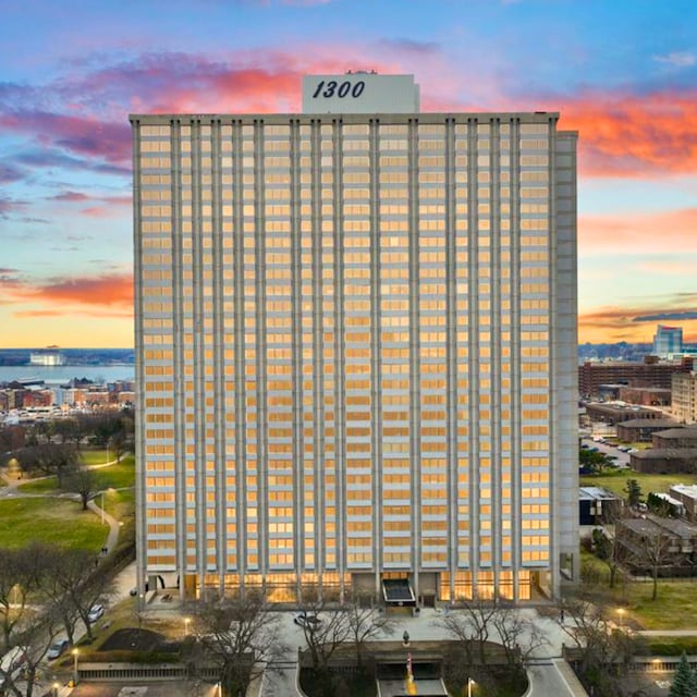 view of outdoor building at dusk