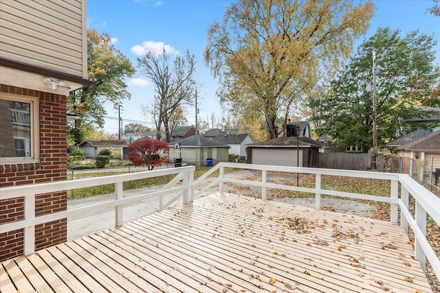 wooden deck with an outdoor structure