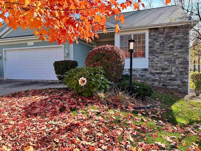 view of home's exterior with a garage