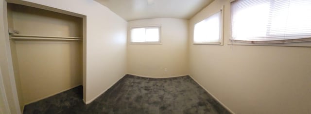 unfurnished bedroom with carpet floors and a closet