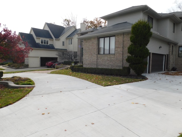 view of side of property featuring a garage