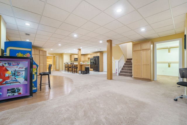 recreation room featuring hardwood / wood-style floors