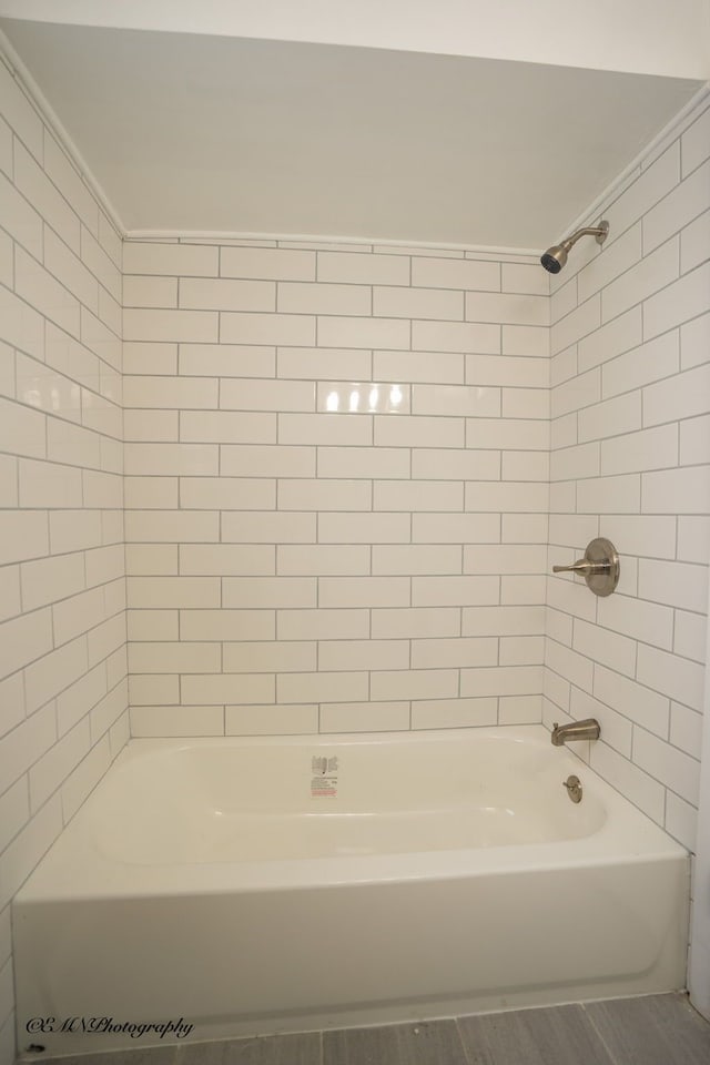 full bath with bathing tub / shower combination