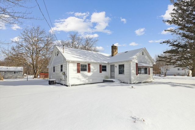 view of front of house with a chimney