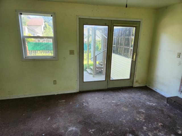 doorway to outside with carpet