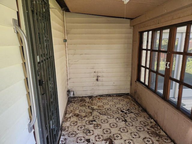 315 Mcomber St, Dowagiac, MI 49047 - unfurnished sunroom with french doors