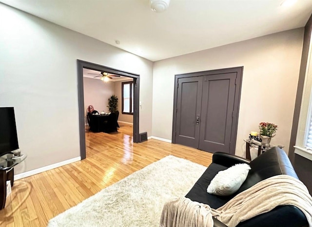 living room with light hardwood / wood-style floors