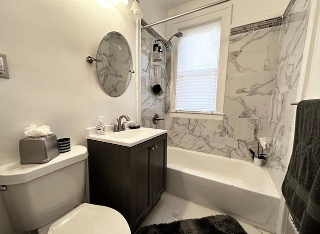 full bathroom with tiled shower / bath combo, vanity, and toilet