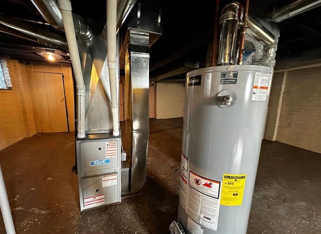 utility room with gas water heater