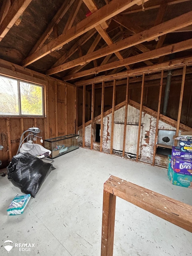 misc room with lofted ceiling