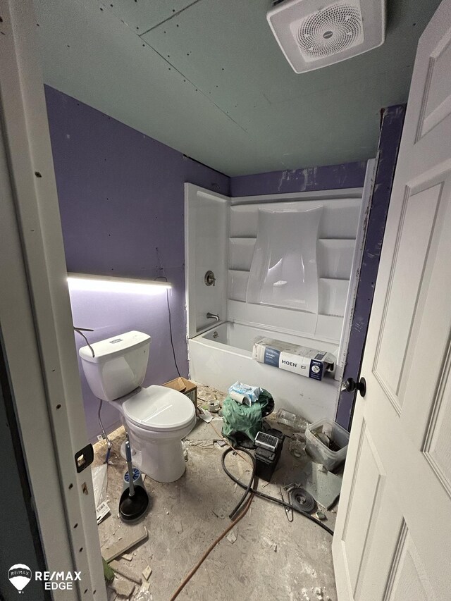 7174 Center Rd, Mount Morris, MI 48458 - full bathroom featuring toilet, a bath, and a shower