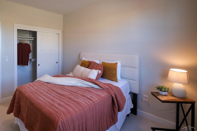 carpeted bedroom with a closet