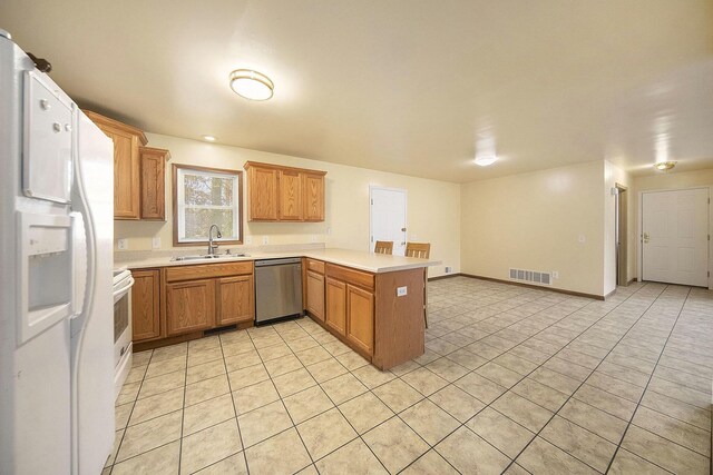 10376 Glencoe Rd, Jerome, MI 49249 - kitchen featuring dishwasher, a sink, a peninsula, white fridge with ice dispenser, and light tile patterned floors