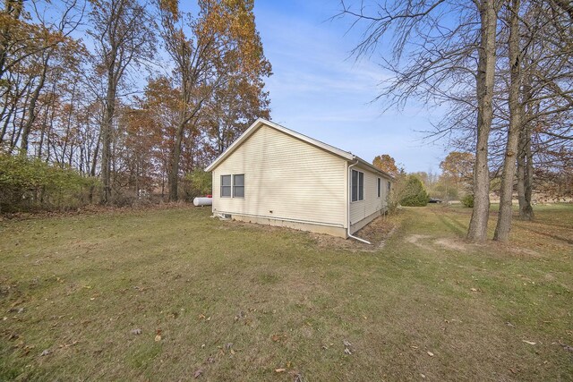 10376 Glencoe Rd, Jerome, MI 49249 - view of side of property with a yard and a chimney