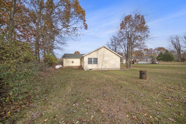 10376 Glencoe Rd, Jerome, MI 49249 - view of home's exterior featuring a yard and crawl space