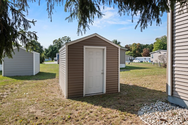 view of outdoor structure featuring a yard