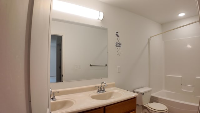 full bathroom with vanity, toilet, and shower / bath combination