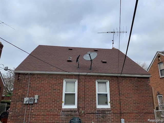 view of side of property with central AC unit