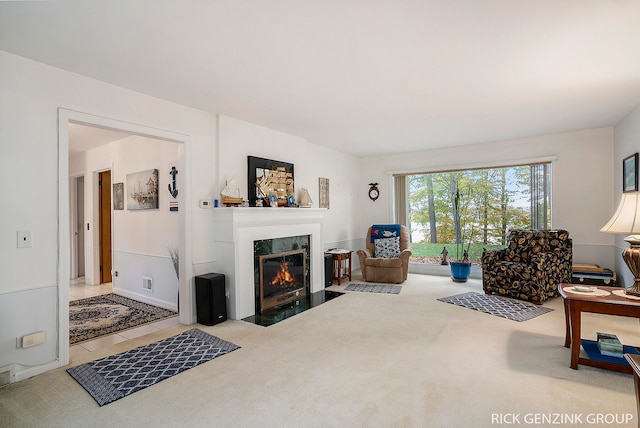 4102 Highgate Rd, Norton Shores, MI 49441 - carpeted living room with a fireplace with flush hearth and visible vents