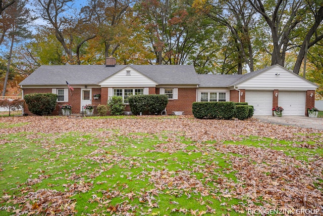 single story home with a garage