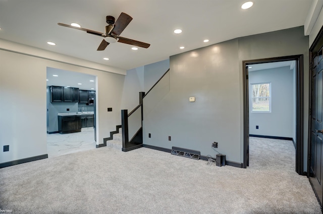 interior space featuring ceiling fan