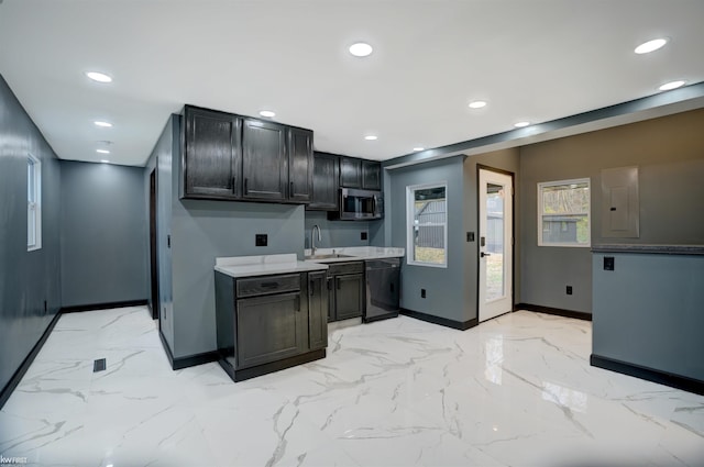 kitchen featuring dishwasher, electric panel, and sink